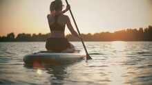 sup board water tourism. paddling on sup paddleboard
