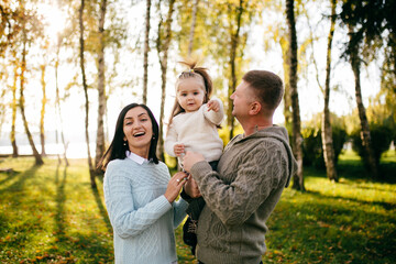 Wall Mural - Family in green nature together