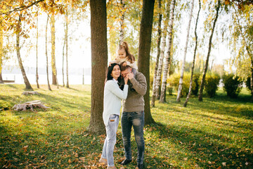 Wall Mural - Family in green nature together