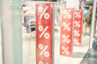 Percent sale red sign at mall. Discount concept. Market interior design. Business model. Lifestyle promotion. Store promo graphic. Shop background. Cheap boutique. Retail commercial price. Money offer