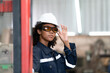 © Wosunan - Portrait of a young female engineer in the welding robot industry