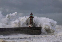Huge Stormy Wave Splash Over Old Lighthouse