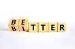 Better or bitter symbol. Concept word Better and Bitter on wooden cubes. Beautiful white table white background. Business and better or bitter concept. Copy space.