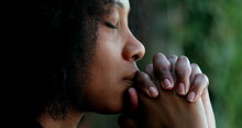 Pensive Black Woman Praying. Thoughtful African Person Seeking Help