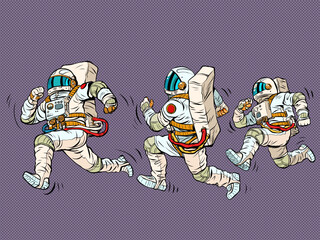 Wall Mural - astronauts are running, a space race. sports and a healthy lifestyle. people in spacesuits