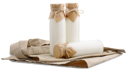 Poster - Fresh organic milk in glass and jug on rustic tablecloth