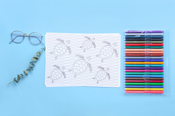 Sticker - Coloring page, felt-tip pens, eyeglasses and eucalyptus branch on blue background