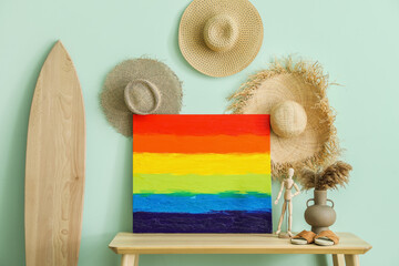 Poster - Painting of LGBT flag, vase and mannequin on table in stylish room