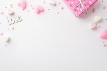 St Valentine's Day Concept. Top View Photo Of Pink Present Box Heart Shaped Marshmallow Candles Inscription Love And Sprinkles On Isolated White Background With Empty Space