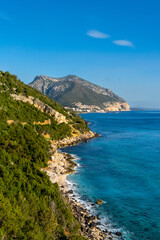 Canvas Print - vertical landscape view of the rugged mountainous green east coast of Sardinia