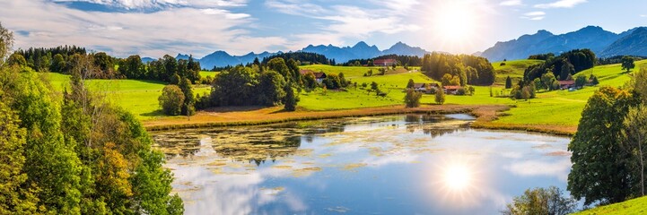 Poster -  panoramic view to rural scene with lake and mountain range