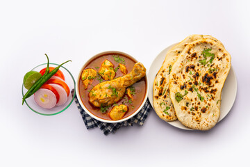 Wall Mural - Red Chicken Curry or murgh Masala or korma with prominent Leg Piece