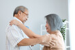 © chokniti - Portrait of happy senior couple with wife embracing husband, nurse doctor senior care caregiver help assistance retirement at home nursing, or hugging after sick in hospital