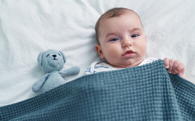 Sticker - Adorable caucasian baby lying on bed with relaxed expression at bedroom