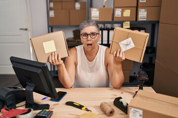 Poster - Middle age woman working at small business ecommerce clueless and confused expression. doubt concept.