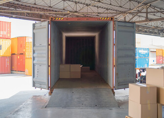 Wall Mural - Shipping container site loading by crane in logistic port warehouse storage factory manufacturing business transportation import and export goods of freight business carrier.