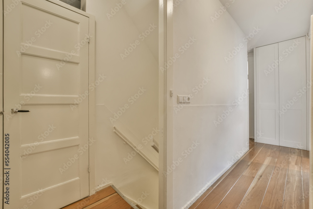 Interior of corridor with entrance door Stock Photo | Adobe Stock