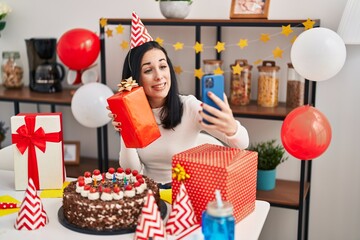 Sticker - Young caucasian woman celebrating birthday having video call at home