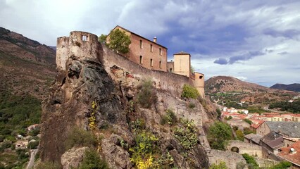 Sticker - Corsica travel and landmarks. aerial drone video of medieval Corte town- mountain village in the central part of the  island 