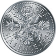 British sixpence money coin, reverse with floral design