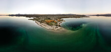Wide Angle View From Aerial View Drone Shot Of Lake Mohave In The National Recreation Area Of Lake Mead In Nevada And Arizona With The Sun Setting Showing Six Mile Cove And Its Sand