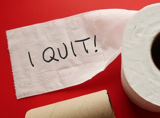 Wall Mural - On red background, toilet paper with handwritten text I QUIT!, decision making to stop or leave permanently, to give up doing something like to resign from job or give up smoking