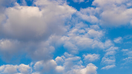 Wall Mural - Blue sky with clouds background. Sky daylight. Natural sky composition. Element of design.