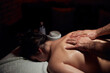 © astrosystem - Woman on a massaging, chiropracting table, treatment of body and skin tension.