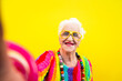 © oneinchpunch - Funny grandmother portraits. Senior old woman dressing elegant for a special event. granny fashion model on colored backgrounds