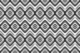 Fototapeta Sypialnia - Fabric ikat pattern art. Geometric ethnic seamless pattern traditional. American, Mexican style. Design for background, wallpaper, illustration, fabric, clothing, carpet, textile, batik, embroidery.