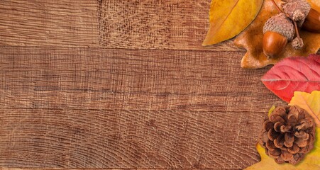 Poster - Colorful dry fall leaves on the desk