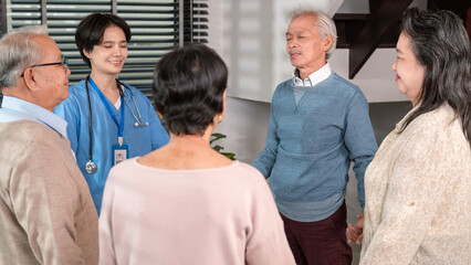 Wall Mural - Group of Asian senior people are given advice by professional self care psychologist  at elderly healthcare center, elder group therapy Geriatric consultation concept