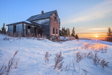 Dilapidated Farm House At Sunrise In Winter, Near Winnipeg; Manitoba, Canada