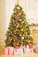 Wall Mural - A large beautiful traditional Christmas tree with gifts in a classic interior.