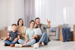 © New Africa - Happy family spending time in new apartment. Moving day