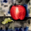 Red apple on table with leaf