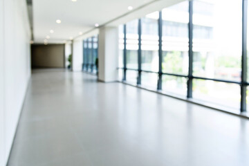 Wall Mural - Abstract defocused blurred background of empty long corridor in the modern hospital