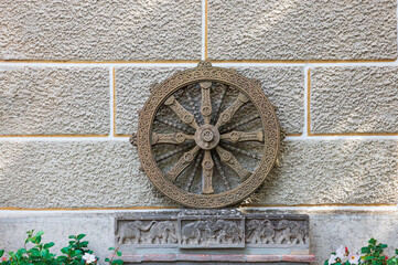 A stone wheel engraved in the walls