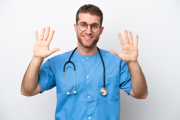 Wall Mural - Young surgeon doctor caucasian man isolated on white background counting ten with fingers