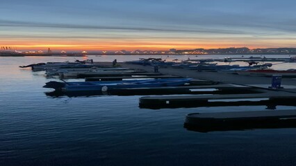 Poster - Vertical video boats in the harbor at sunset Nessebar Bulgaria, beautiful seascape