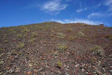 Volcanic landscapes of Lanzarote. Solidified lava, lava chimney, lava tunnel, sea of lava, eruption, canary islands, crater, volcano, black rocks, photographed in November 2022, trekking trip,