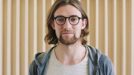 Programming, coding and face of a man in software development, cyber security and IT engineering. Glasses, programmer and portrait of an information technology developer, web designer and worker