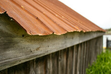 A Rusty Tin Roof Over An Old Wooden Shack.  Image Has Intentional Blur And Copy Space.
