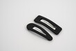 set of two black hair grips slides styles isolated on a white background