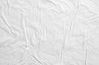© Piman Khrutmuang - white crumpled and creased paper poster texture background
