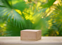Table Top Wood Podium Counter In Tropical Outdoor Nature Garden Forest Jungle Green Plant With Golden Sunlight Background. Healthy Natural Product Placement Promotion Display.spring Or Summer Concept.