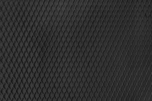 Steel Black Protective Grille With Mesh Background Texture And Pattern. Industrial Corrugated Rough Iron Surface