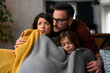 © Dorde - The father is worried about his family because there is no heating at home. Mom is sad.