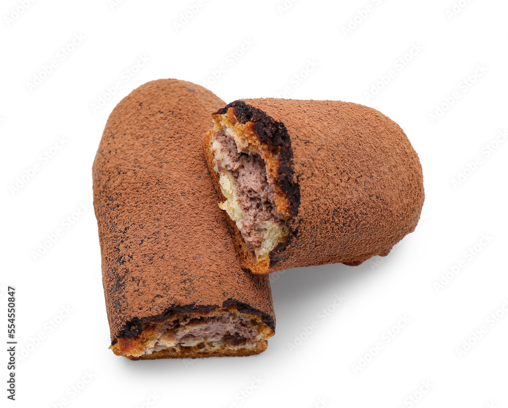 Halves of tasty chocolate eclair on white background