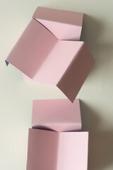 Canvas Print - folded 3d pink paper cards viewed from top